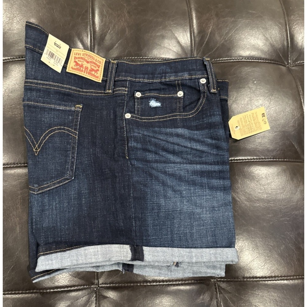 Levi's Women Size 33 Mid Length Blue Denim Shorts Cuffed Dark Distressed Stretch